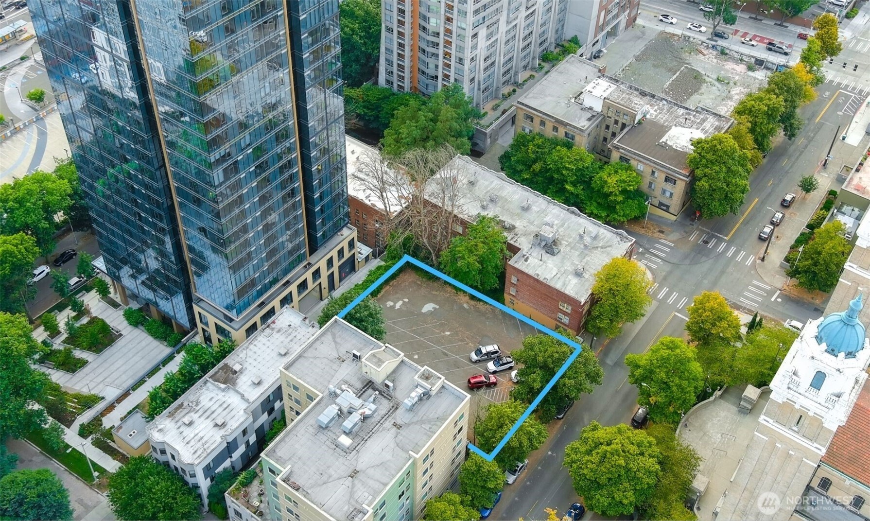 an aerial view of multiple house with yard