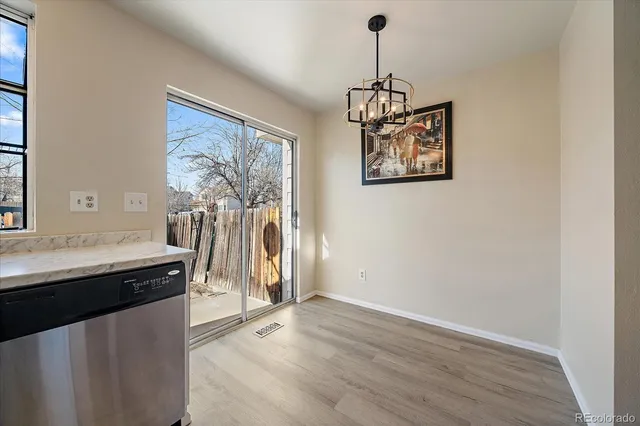 a view of a room with a chandelier