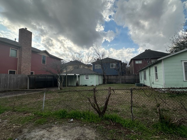 2543 Bevis Street Houston, TX 77008 - Photo 5 of 9 a view of a house with a yard