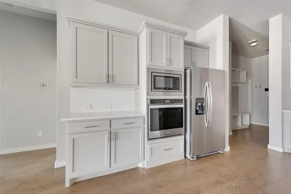 a view of a room with racks on the wall