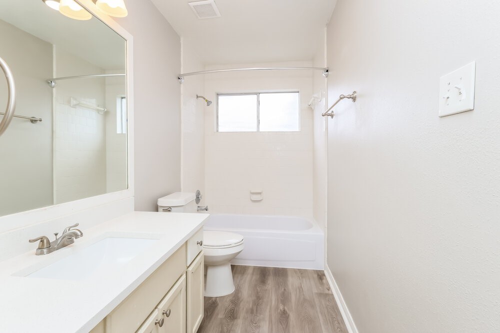 2711 Knollbrook Lane Spring, TX 77373 - Photo 16 of 17 a bathroom with a sink a toilet and a bathtub