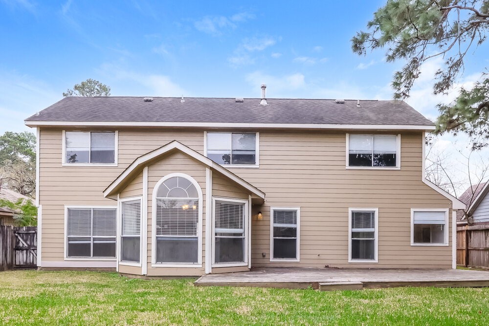 2711 Knollbrook Lane Spring, TX 77373 - Photo 17 of 17 a view of a house with a backyard
