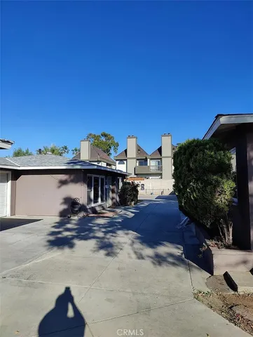 a view of a house with a swimming pool