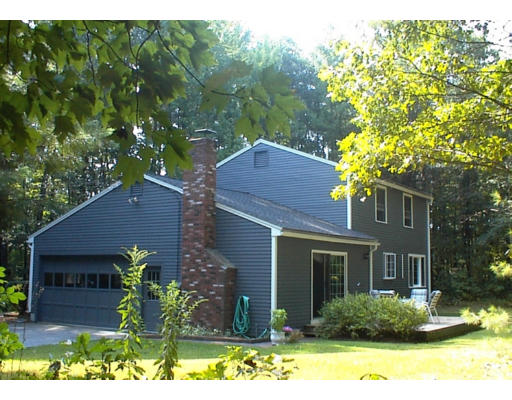 122 Haynes Road Townsend, MA 01469 - Photo 4 of 5 a front view of a house with a yard