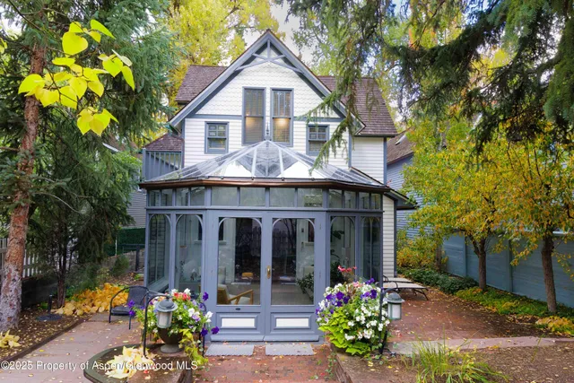 a front view of a house with a porch