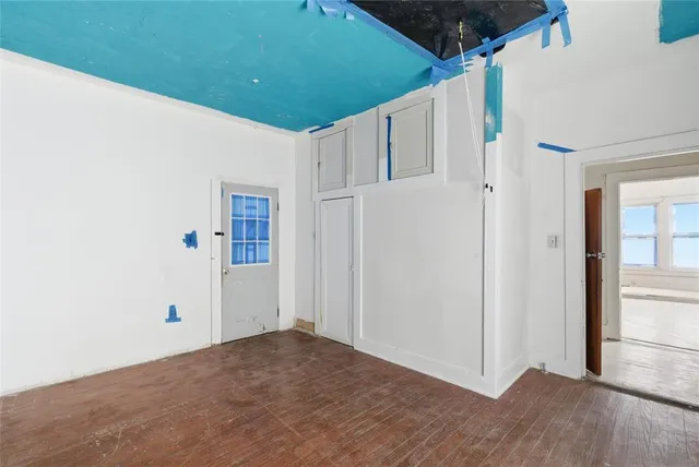 a white refrigerator freezer sitting inside of a kitchen