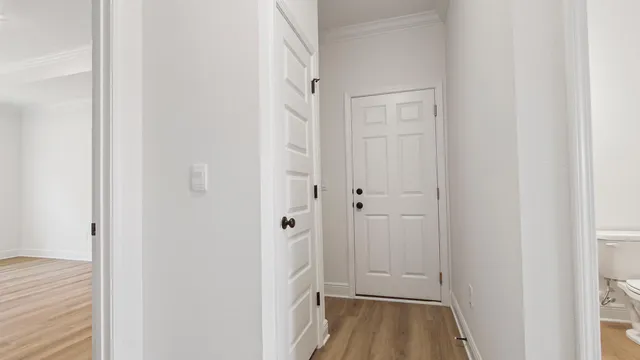 a bathroom with a tub shower vanity and a sink