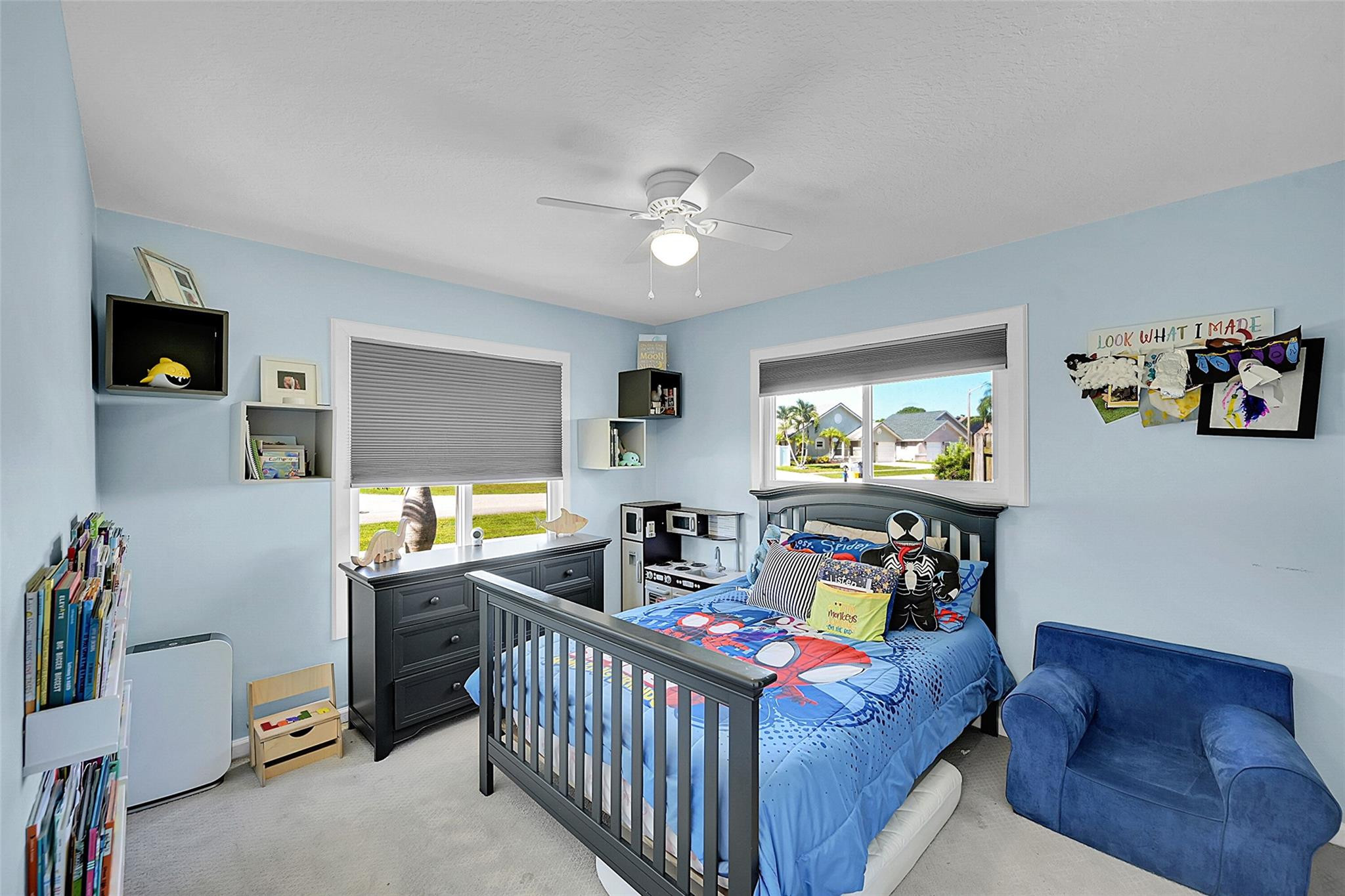 22533 Swordfish Drive Boca Raton, FL 33428 - Photo 24 of 49 a bedroom with furniture and a window