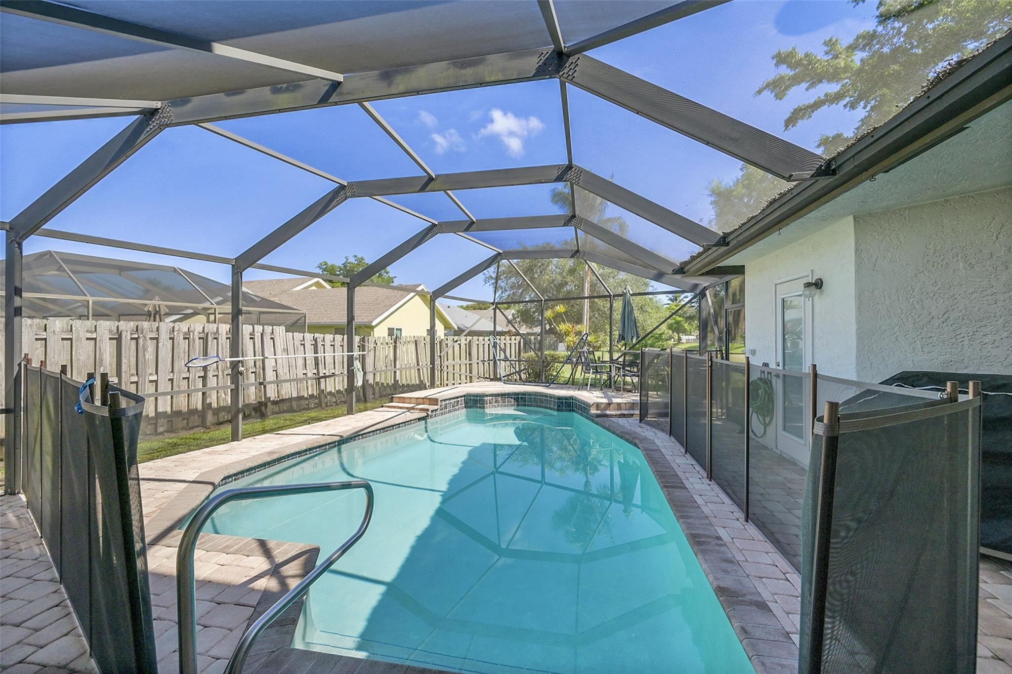 22533 Swordfish Drive Boca Raton, FL 33428 - Photo 27 of 49 a view of a swimming pool