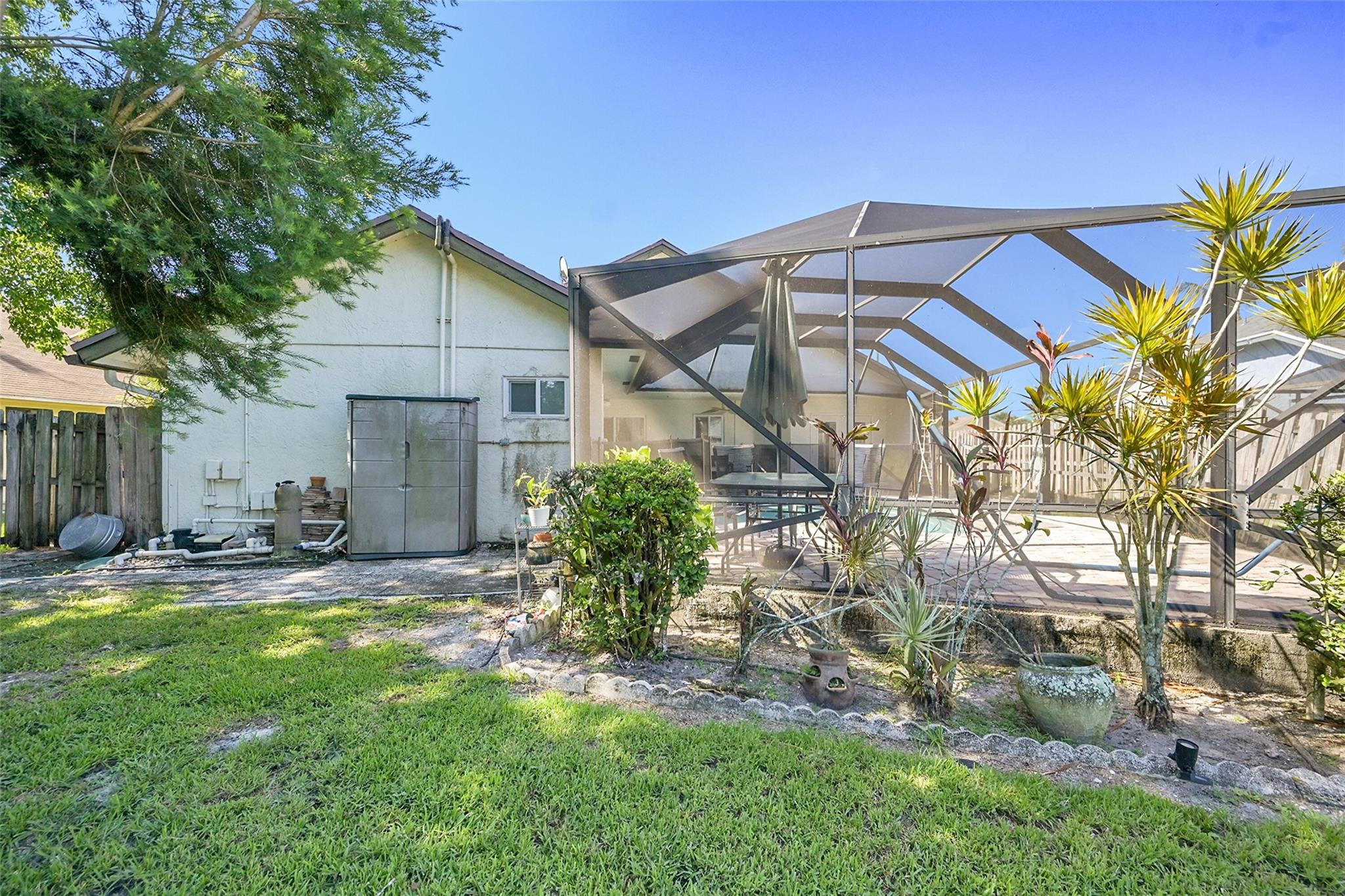 22533 Swordfish Drive Boca Raton, FL 33428 - Photo 31 of 49 a view of a house with a yard and sitting area