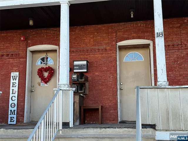 a brick house with a door