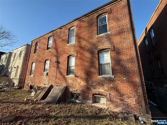 a brick building with a large windows