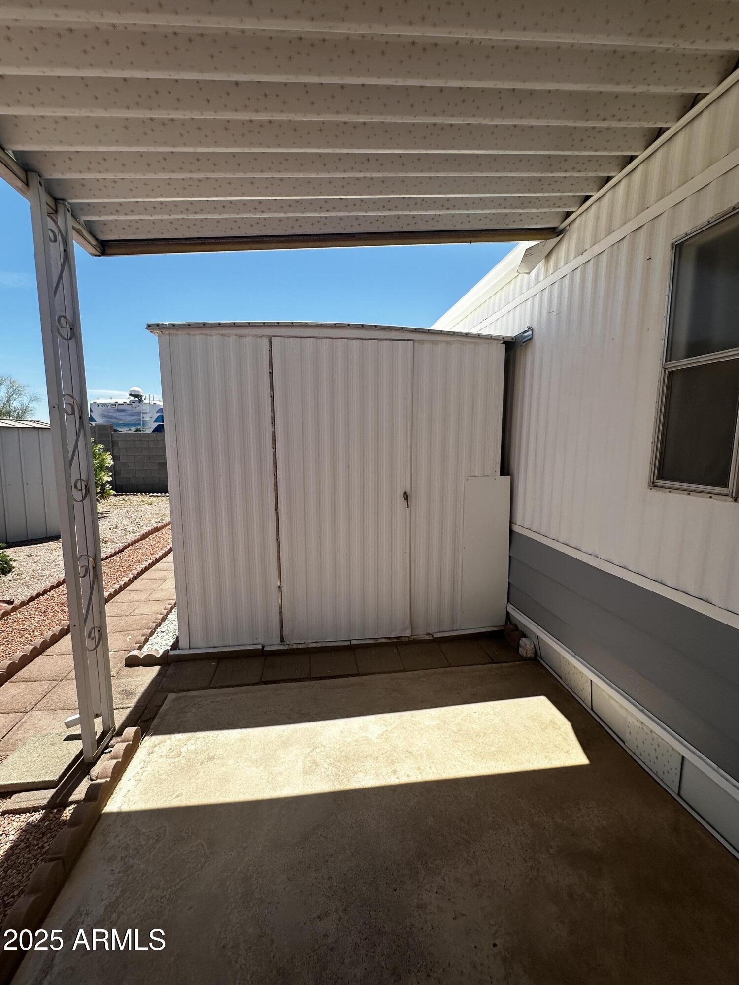 2605 South Tomahawk Road, Unit 8 Apache Junction, AZ 85119 - Photo 15 of 21 a view of a backyard