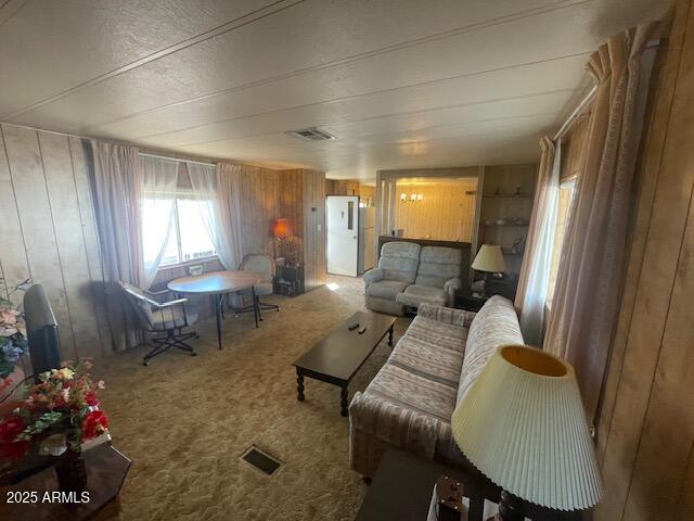2605 South Tomahawk Road, Unit 8 Apache Junction, AZ 85119 - Photo 2 of 21 a living room with furniture and a window