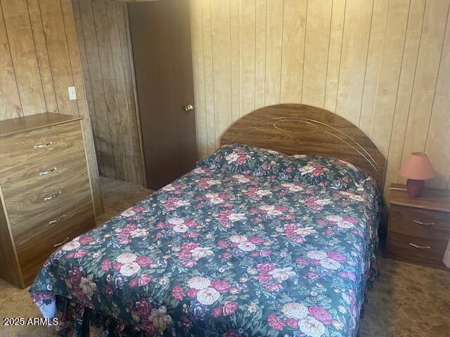 2605 South Tomahawk Road, Unit 8 Apache Junction, AZ 85119 - Photo 6 of 21 a bedroom with a bed and a dresser