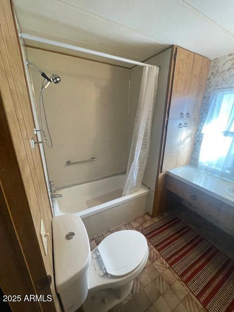 2605 South Tomahawk Road, Unit 8 Apache Junction, AZ 85119 - Photo 8 of 21 a bathroom with a toilet and a shower