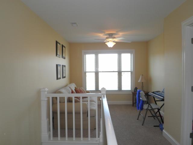 480 Knox Pearson Road Manchester, TN 37355 - Photo 12 of 20 Sitting area at the top of the stairs is large enough to be its own room. Would be a great place to sneak off and read a book or nap.