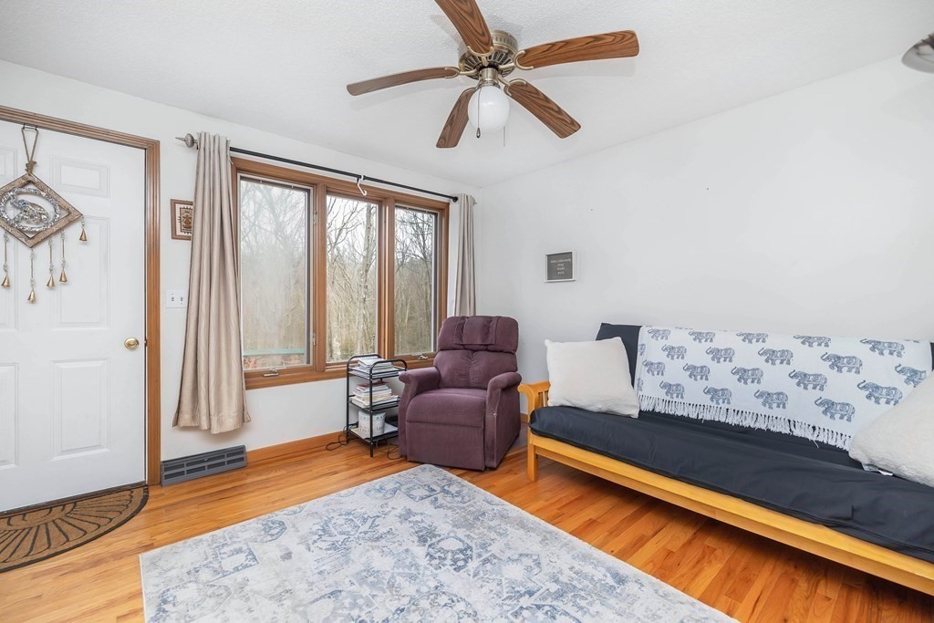 140 North Monson Road Hampden, MA 01036 - Photo 20 of 29 a living room with furniture and a large window