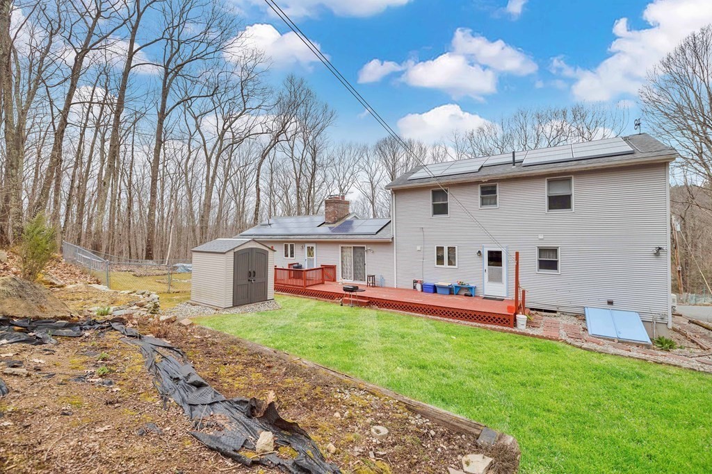 140 North Monson Road Hampden, MA 01036 - Photo 29 of 29 a view of a house with a yard and sitting area