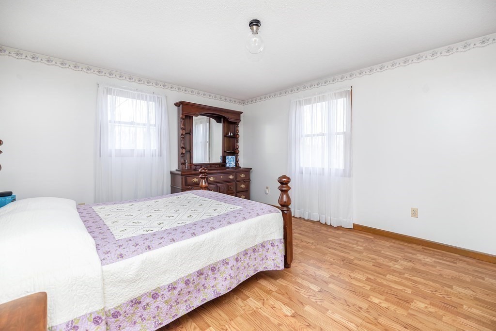 140 North Monson Road Hampden, MA 01036 - Photo 10 of 29 a bedroom with a bed and a window