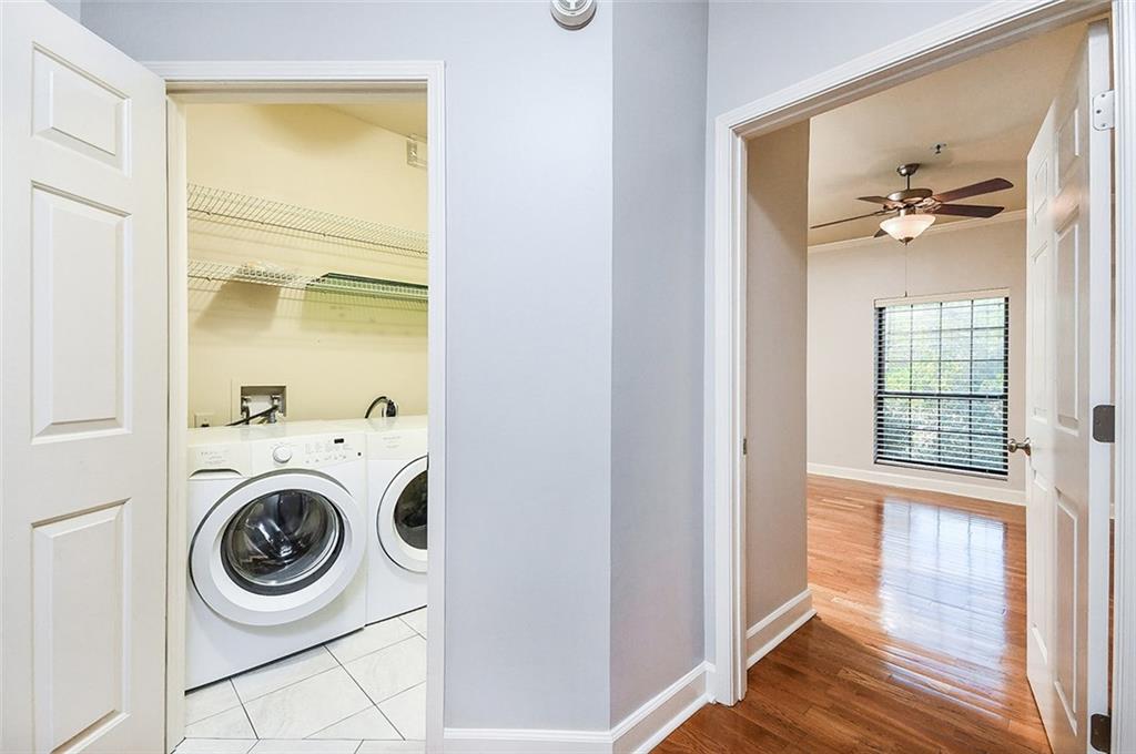 2865 Lenox Road Northeast, Unit 407 Atlanta, GA 30324 - Photo 25 of 27 a bathroom with a sink and a mirror