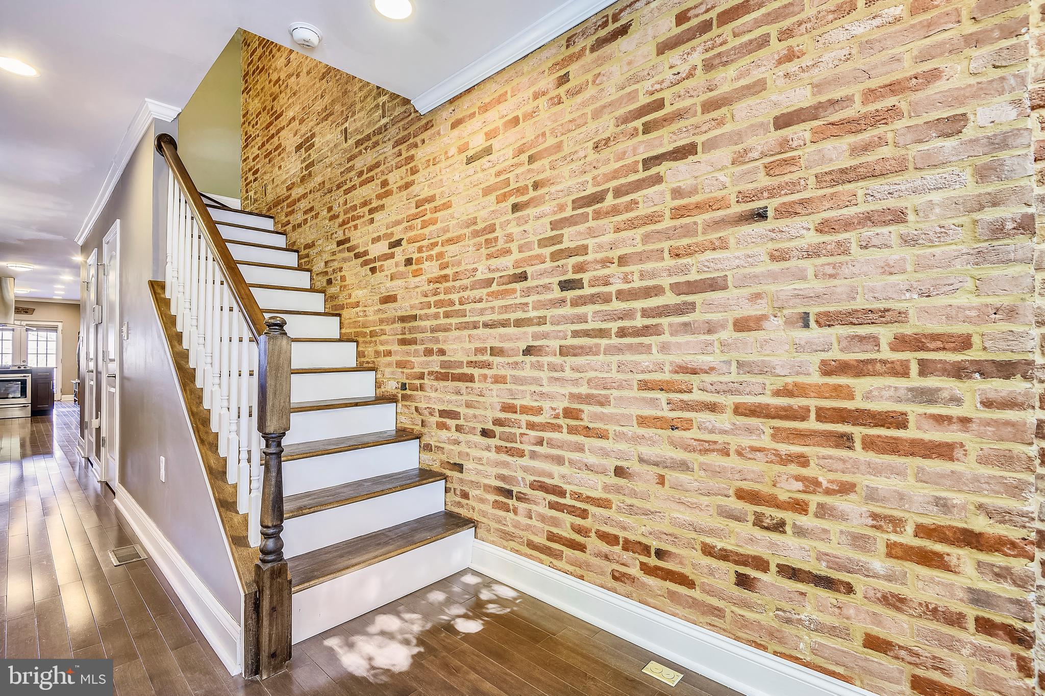 2904 Keswick Road Baltimore, MD 21211 - Photo 15 of 42 Exposed Brick to Upper Level