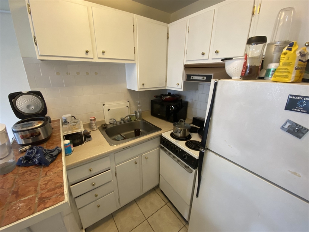 712 Commonwealth Avenue, Unit 2 Boston, MA 02215 - Photo 11 of 13 a room with storage and utility