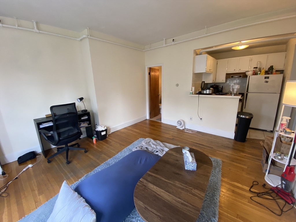 712 Commonwealth Avenue, Unit 2 Boston, MA 02215 - Photo 6 of 13 a bedroom with a bed and furniture