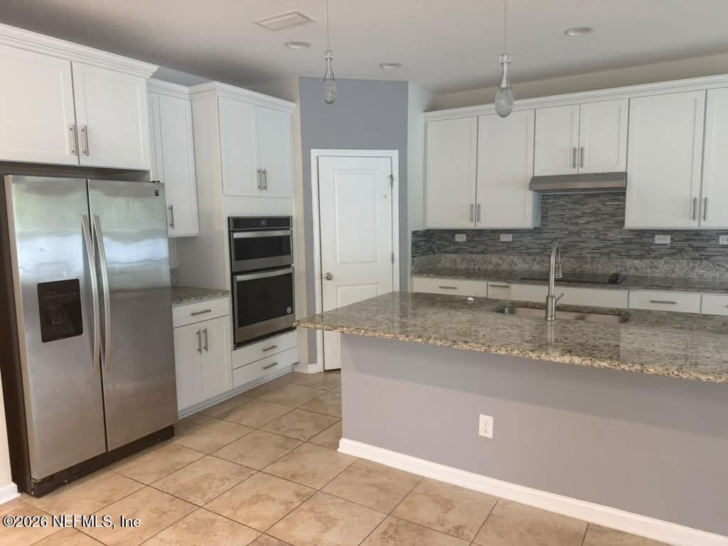 2103 Hawkeye Place Fleming Island, FL 32003 - Photo 5 of 28 WhatsApp Image 2026-06-15 at 10.30.33 PM
