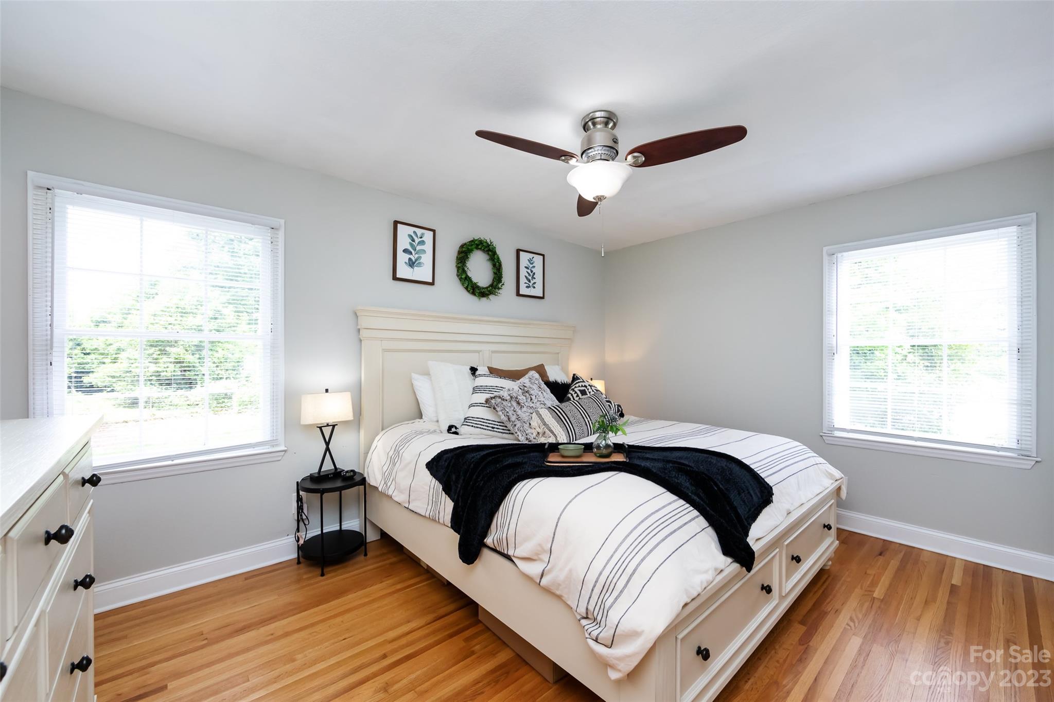 513 Sandridge Road Charlotte, NC 28210 - Photo 15 of 32 a bedroom with a bed and a window