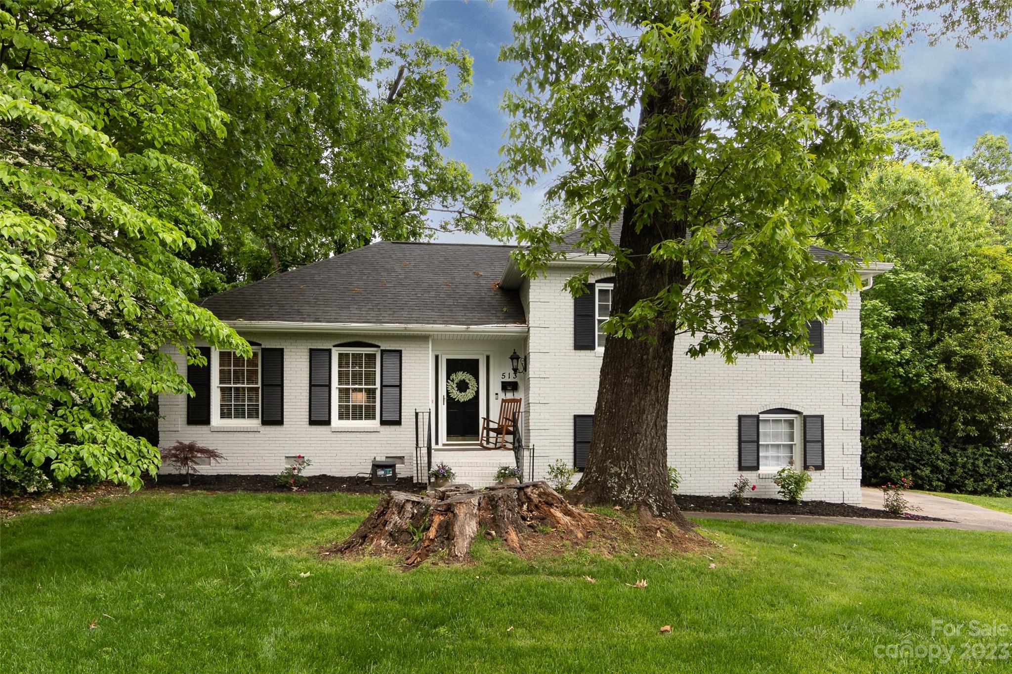 513 Sandridge Road Charlotte, NC 28210 - Photo 2 of 32 a view of a house with a backyard