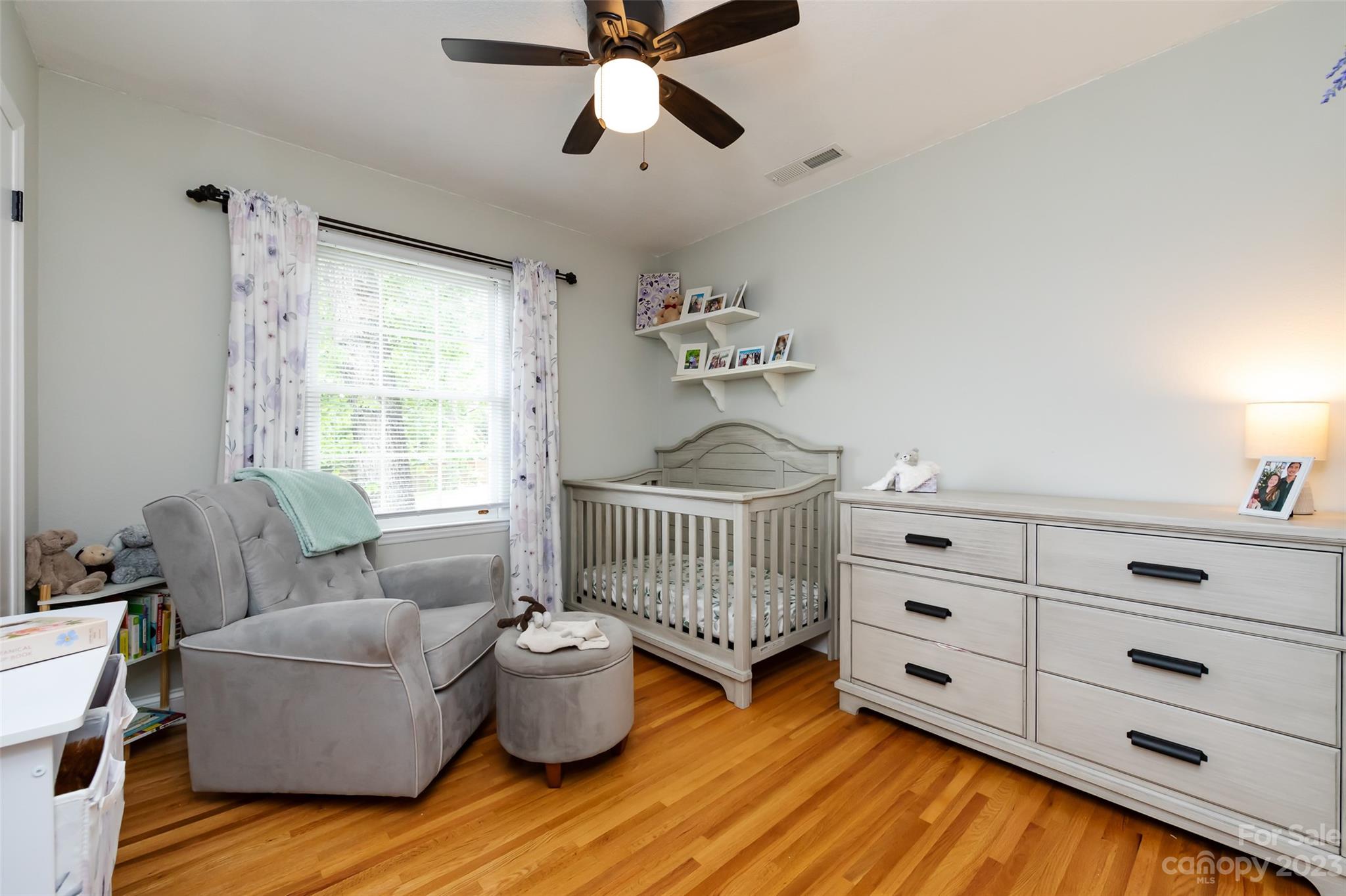 513 Sandridge Road Charlotte, NC 28210 - Photo 21 of 32 a bedroom with a bed and a window