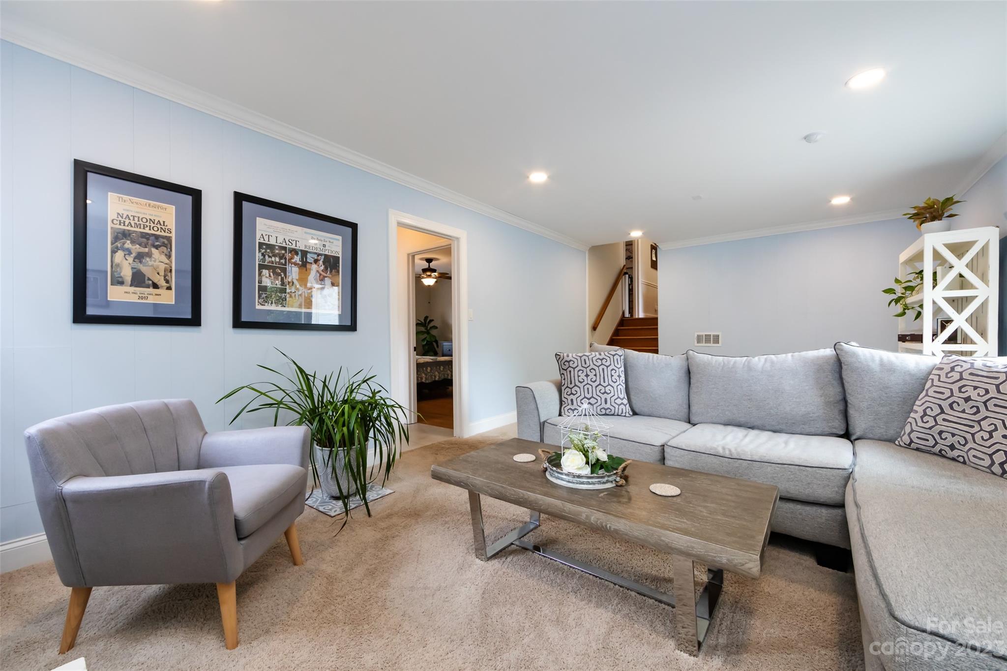 513 Sandridge Road Charlotte, NC 28210 - Photo 23 of 32 a living room with furniture and wooden floor