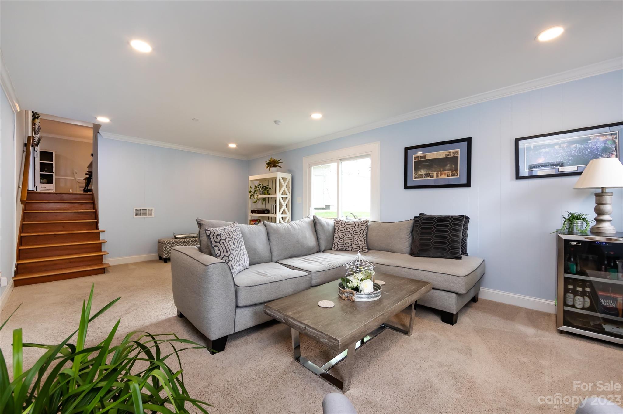 513 Sandridge Road Charlotte, NC 28210 - Photo 24 of 32 a living room with furniture and wooden floor