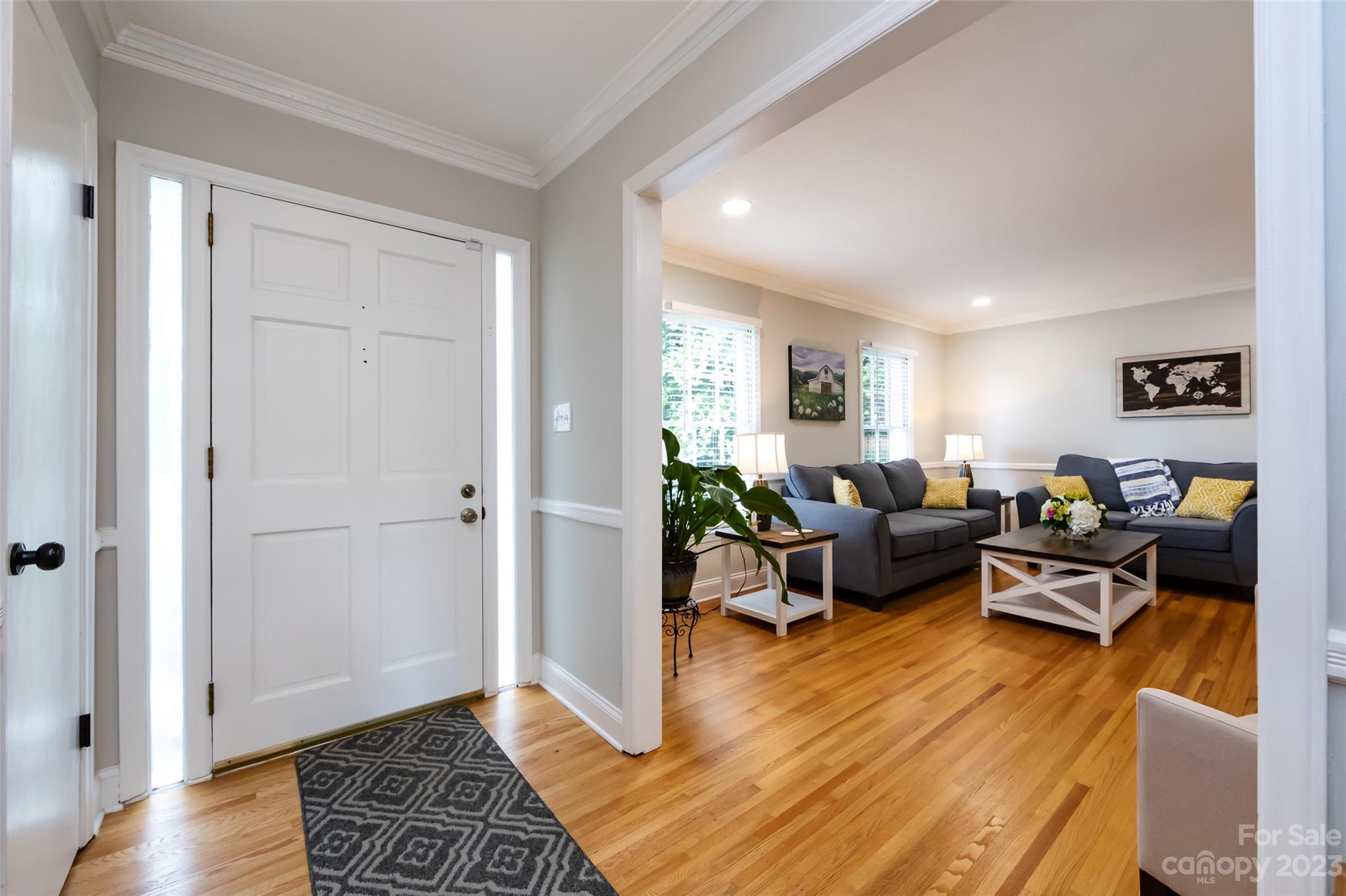 513 Sandridge Road Charlotte, NC 28210 - Photo 6 of 32 a living room with furniture and wooden floor