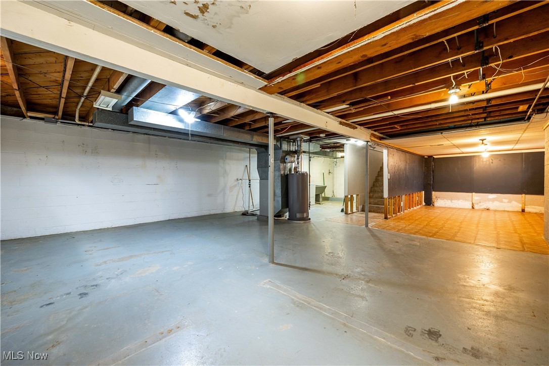 8764 Oberlin Road Elyria, OH 44035 - Photo 5 of 18 Basement featuring water heater