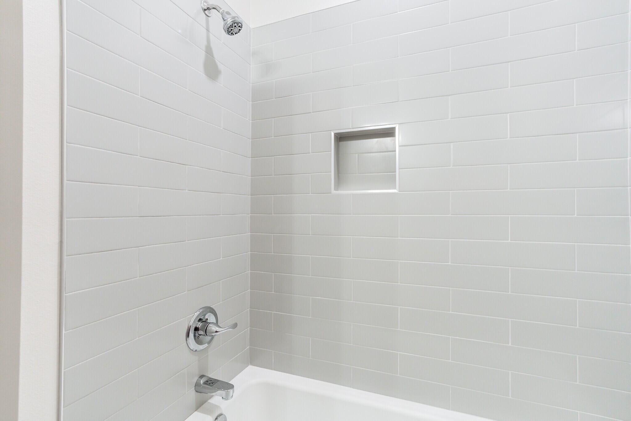7048 41st Street Lubbock, TX 79407 - Photo 25 of 34 a bathroom with a shower