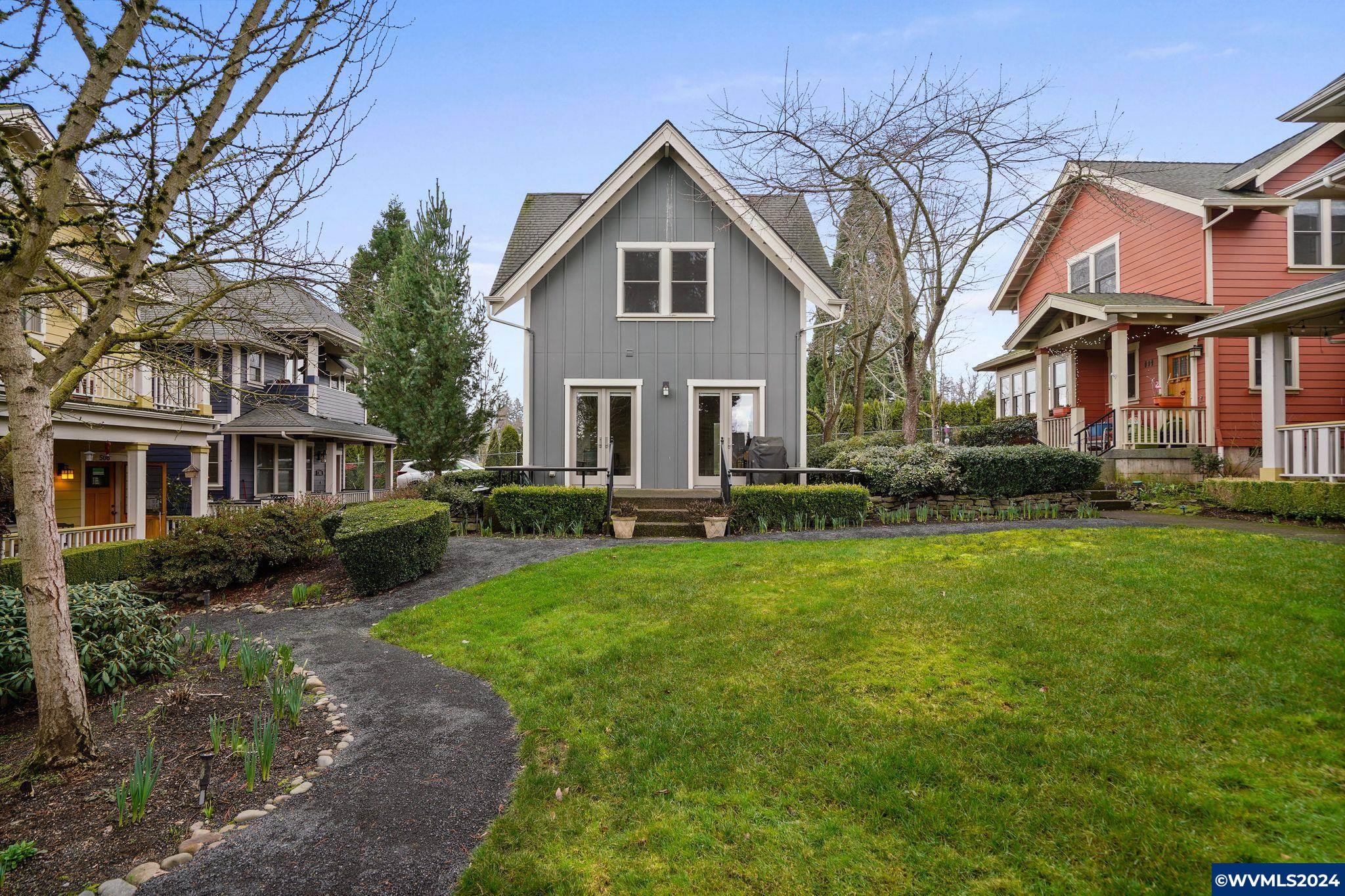 512 Rural Avenue South Salem, OR 97302 - Photo 29 of 36 a front view of a house with a yard and trees