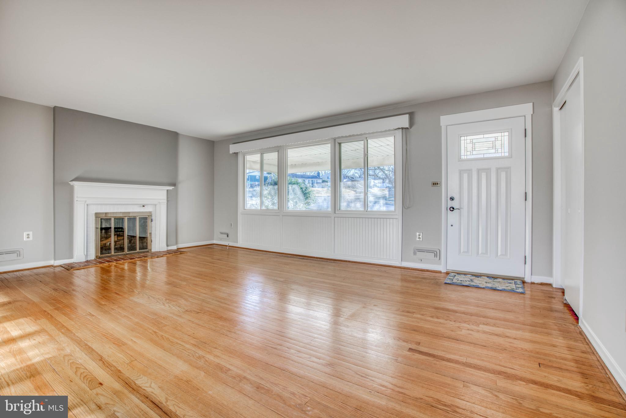 1811 Reuter Road Lutherville-Timonium, MD 21093 - Photo 7 of 37 Spacious living room with fireplace.