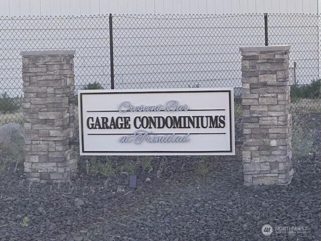 9967 Rd W 8 Northwest, Unit J51 Quincy, WA 98848 - Photo 1 of 9 a sign on the side of a building