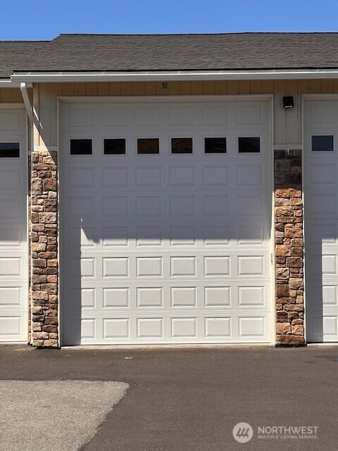 9967 Rd W 8 Northwest, Unit J51 Quincy, WA 98848 - Photo 2 of 9 a front view of a house