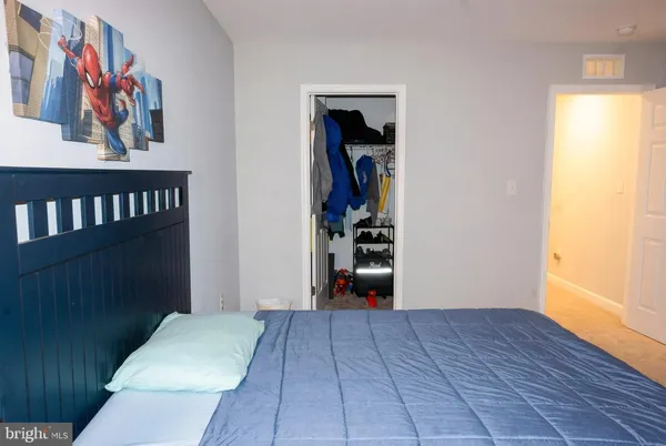 a view of front door with wooden floor