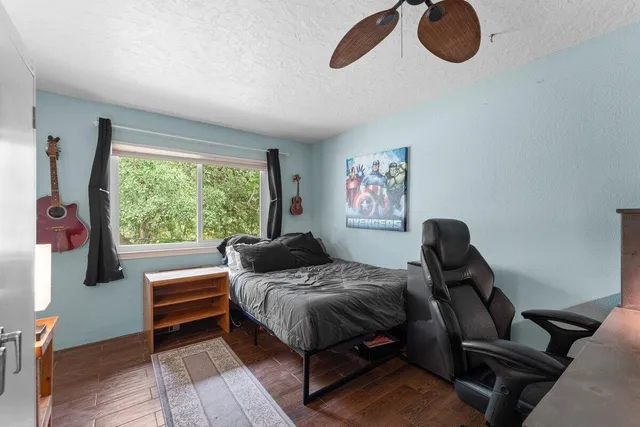 a bathroom with a shower and a toilet