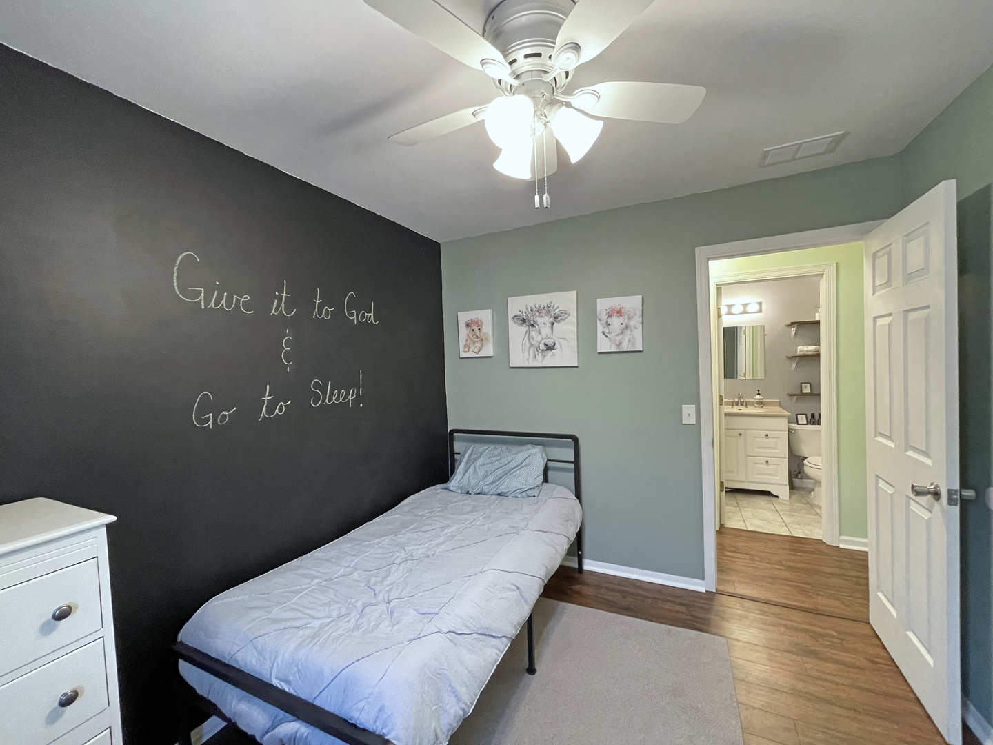 35 Winrock Road Montgomery, IL 60538 - Photo 19 of 37 a bedroom with a bed and a chandelier