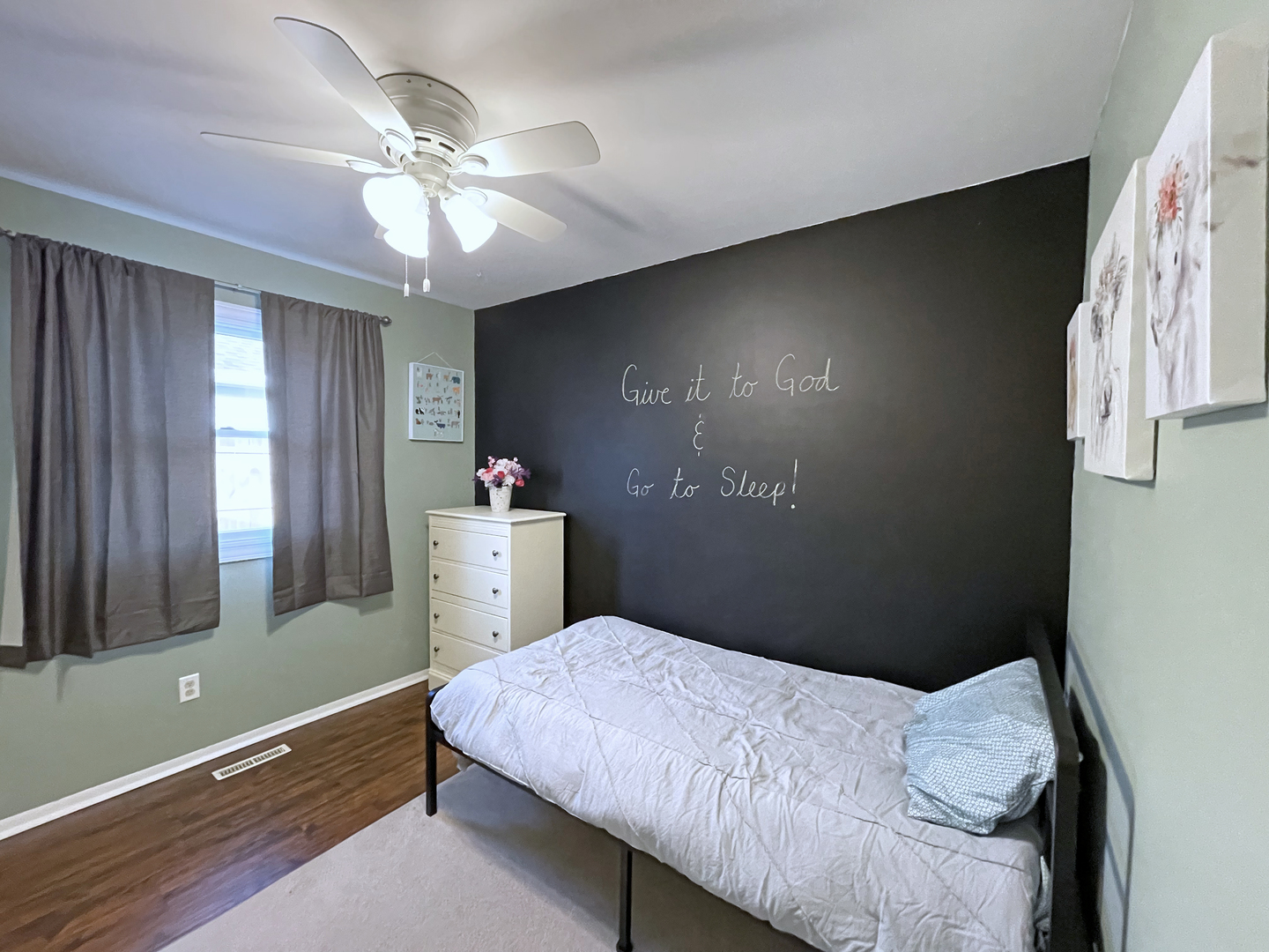35 Winrock Road Montgomery, IL 60538 - Photo 20 of 37 a bedroom with a bed and a chandelier