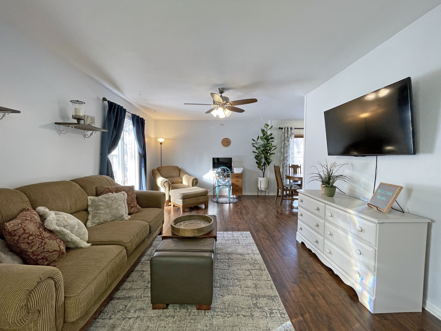 35 Winrock Road Montgomery, IL 60538 - Photo 2 of 37 a living room with furniture and a flat screen tv