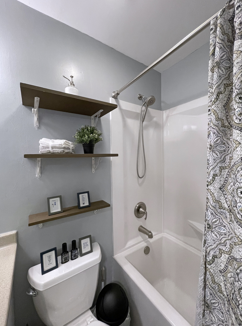 35 Winrock Road Montgomery, IL 60538 - Photo 23 of 37 a bathroom with a shower a toilet and sink