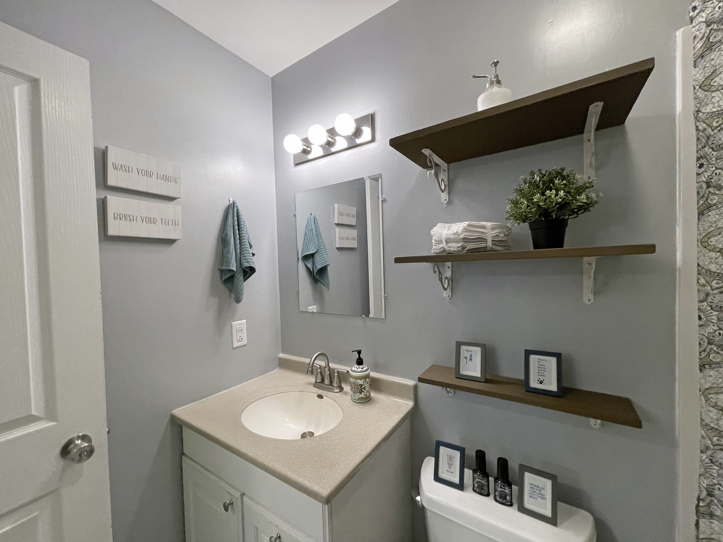 35 Winrock Road Montgomery, IL 60538 - Photo 24 of 37 a bathroom with a sink and a mirror
