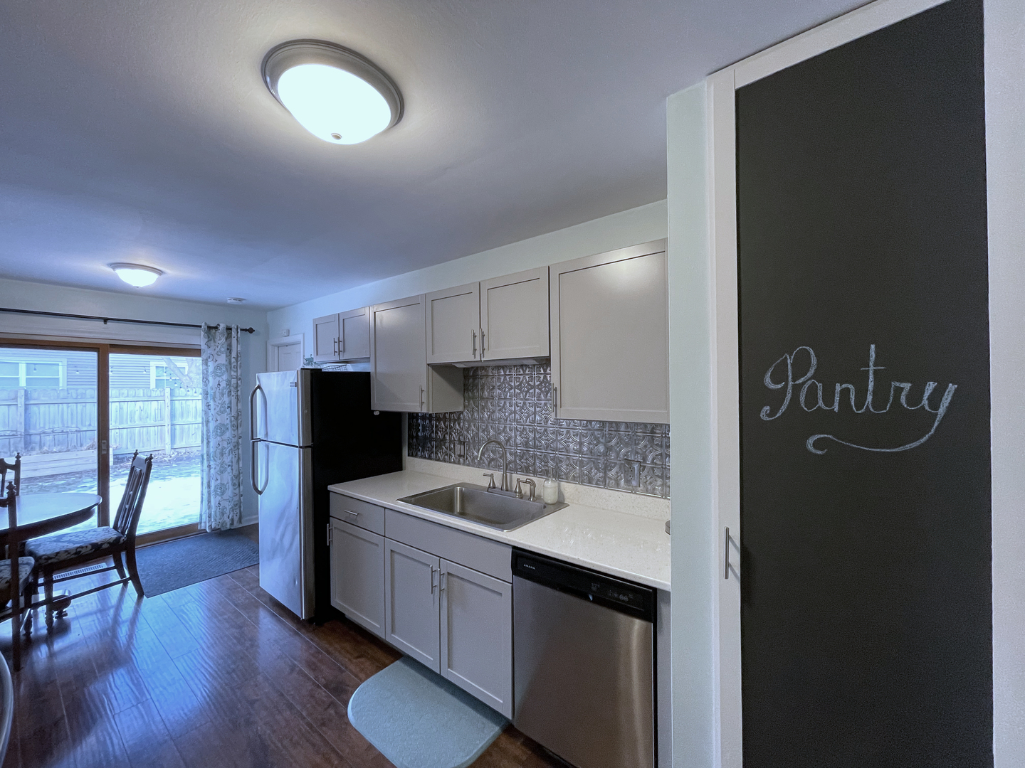35 Winrock Road Montgomery, IL 60538 - Photo 10 of 37 a kitchen with a sink cabinets and refrigerator