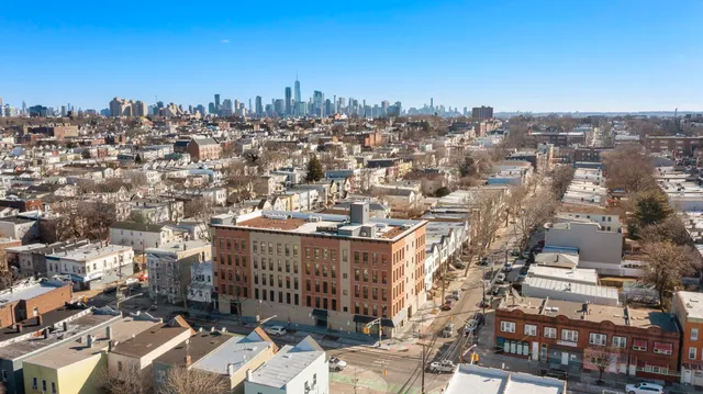 a view of a city with tall buildings in the background